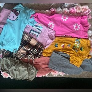 8 pieces diferente sizes 10/12 . Hello Kitty Sequin Aqua and Pink Top